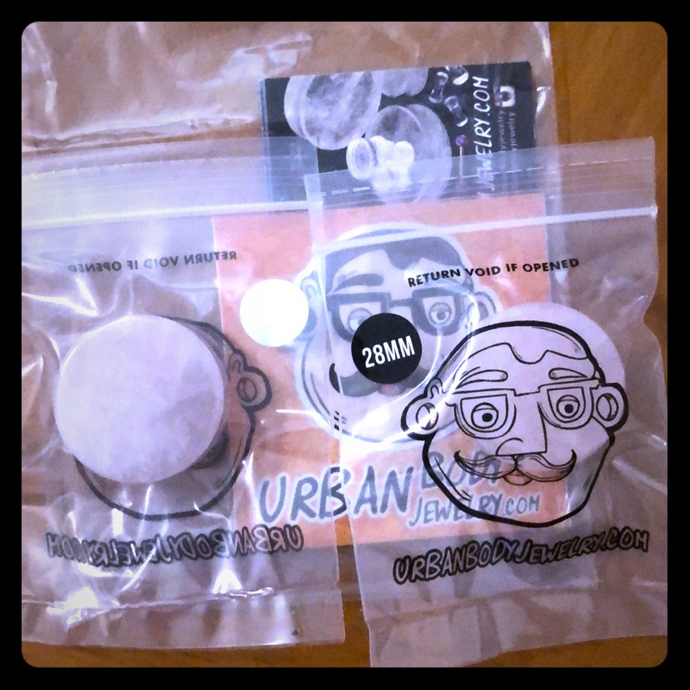 Unworn Unopen 28mm rose quartz gauges